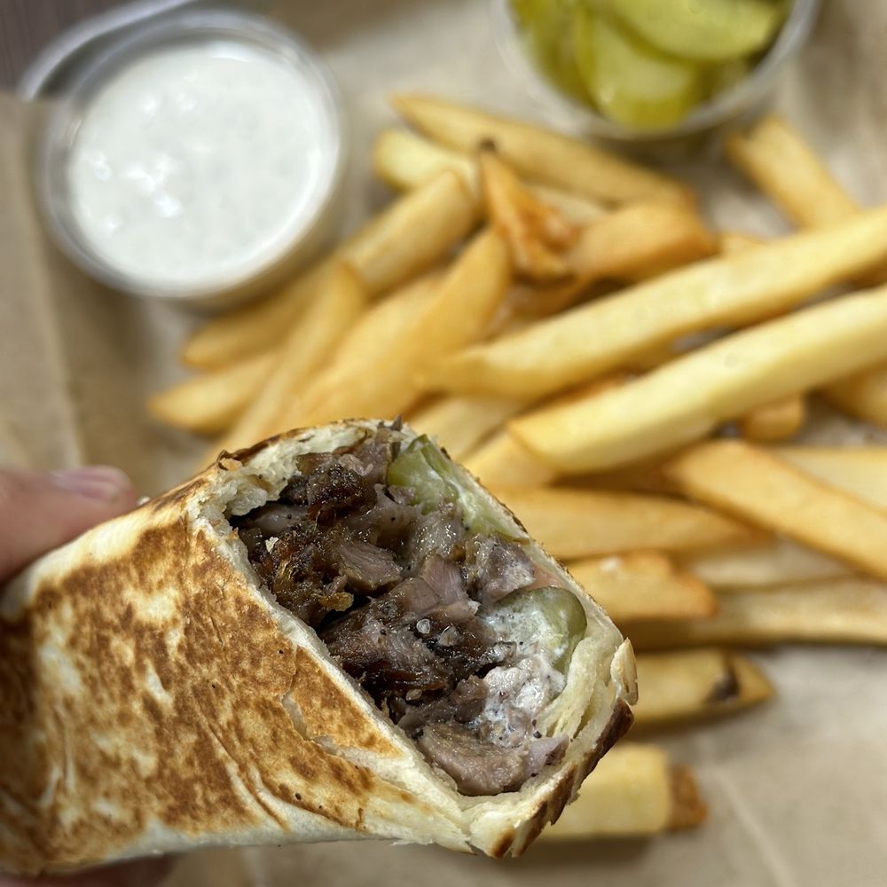 The Compass signature dishes Hummus by “Habibi”
Chicken Shawarma Wrap
Beef Bourguignon
